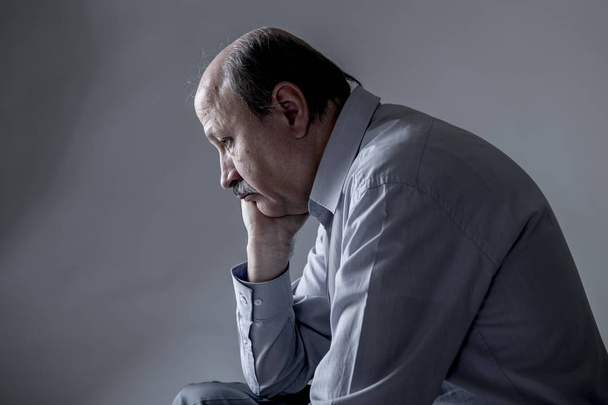 head portrait of senior mature old man on his 60s looking sad and worried suffering pain and depression in sadness face expression - Photo, Image