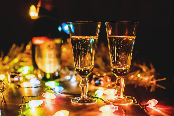 Two sparkling champagne glasses new year celebration christmas - Photo, Image