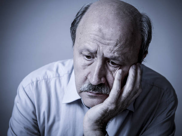 head portrait of senior mature old man on his 60s looking sad an - Foto, afbeelding