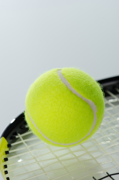 Tennis ball and racket - Fotó, kép