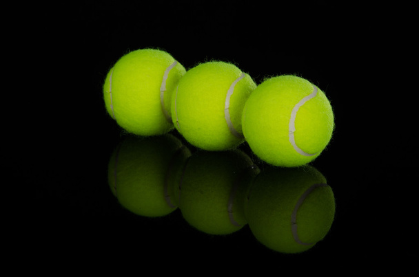 Three tennis balls - Foto, afbeelding
