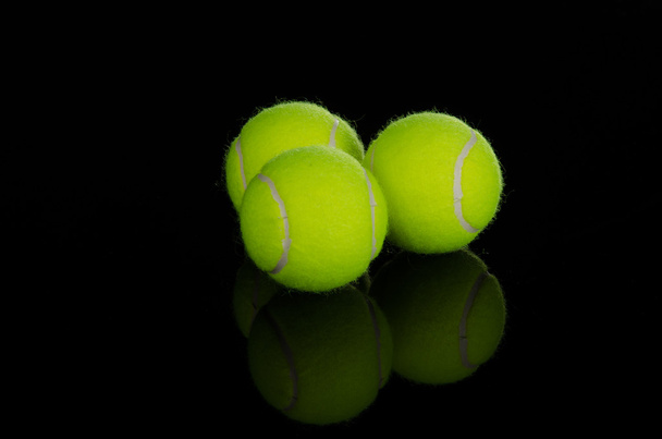 Three tennis balls - Foto, afbeelding