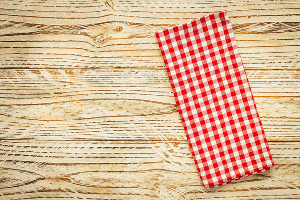 Kitchen cloth on wood table with copy space - Vintage Filter - Foto, imagen