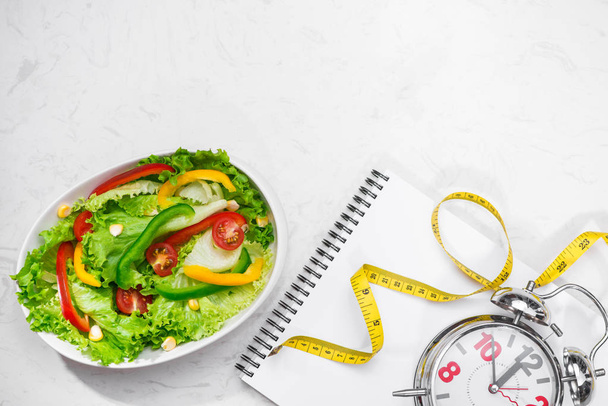Healthy fitness meal with fresh salad. Diet concept. - Φωτογραφία, εικόνα