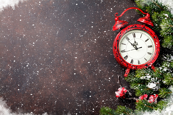 snowy fir tree and alarm clock - Photo, Image