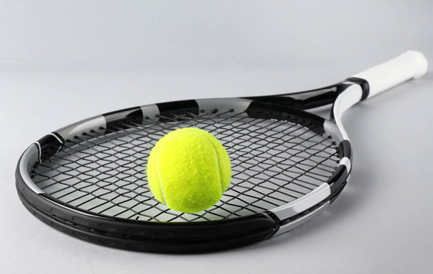 Tennis racket and ball  - Fotografie, Obrázek