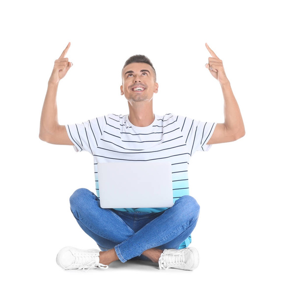 Young man with laptop   - Foto, Imagen