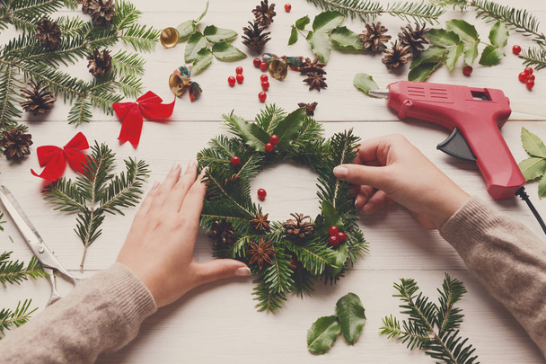 Prepare for xmas, creative craft wreath. Making christmas wheath - Valokuva, kuva