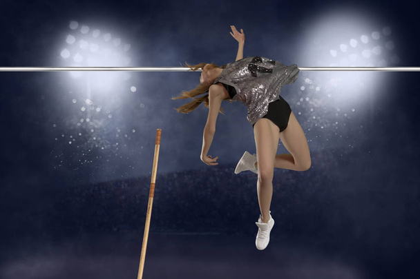 Competition pole vault jumper female - Foto, imagen