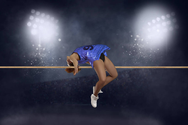 Woman in action of high jump  - Fotoğraf, Görsel