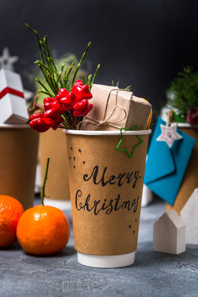 Christmas present in coffee cup, Marry Christmas - Photo, image