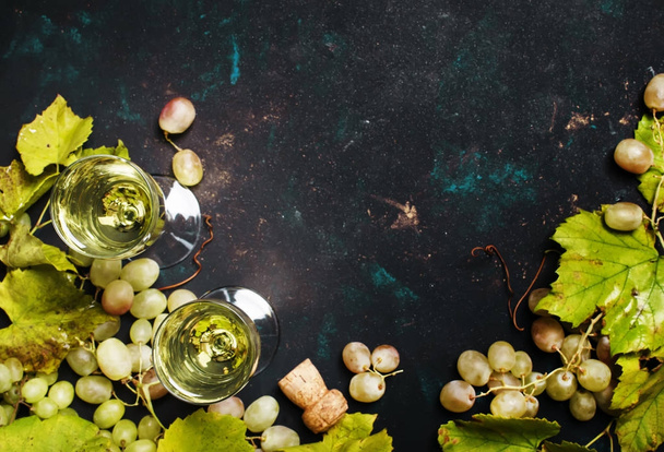 Champagne In Glasses, Grapes With Vine  - Foto, afbeelding
