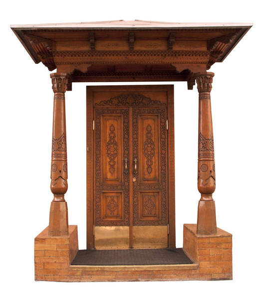 Porche de madera tallada con puerta aislada sobre fondo blanco
 - Foto, imagen
