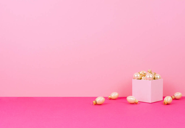 Christmas tree balls on a pink background - Photo, Image