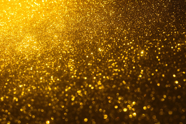 golden glitter texture Colorfull Blurred abstract background - Photo, image