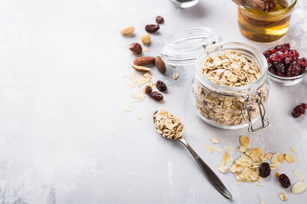 Ingredients for homemade oatmeal granola - Photo, Image