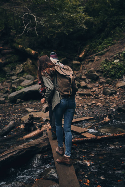 couple hiking together in mountain - Zdjęcie, obraz