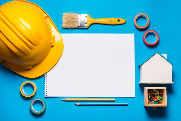 Building tools on blue background, colorfull.  - Foto, imagen