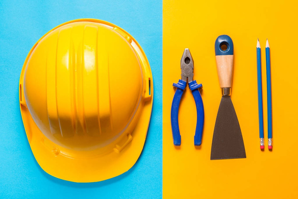 Construction tools on colorful background - Foto, imagen