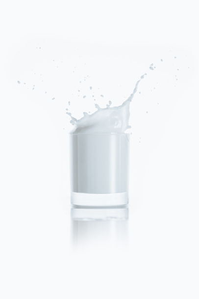 glass of milk with splash - Photo, Image