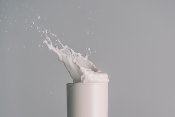glass with splash of milk - Photo, Image