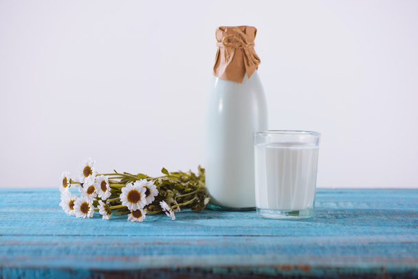 bottle and glass of fresh milk  - Фото, зображення