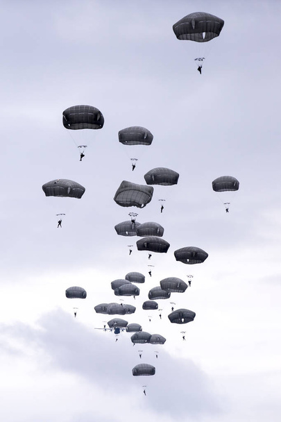lots of parachutists in the sky - Photo, Image