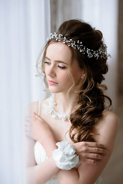 Brunette bride in fashion white wedding dress with makeup - Photo, Image
