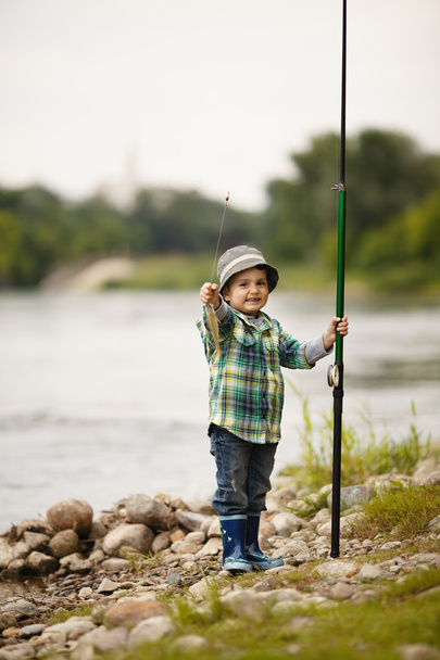 photo of little boy fishing - Foto, immagini