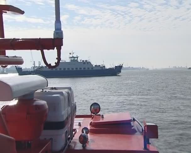 Small ferry baltija flies in front of another vessel. - Footage, Video