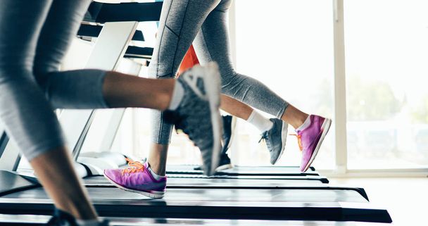 Picture of people running on treadmill in gym - Photo, Image