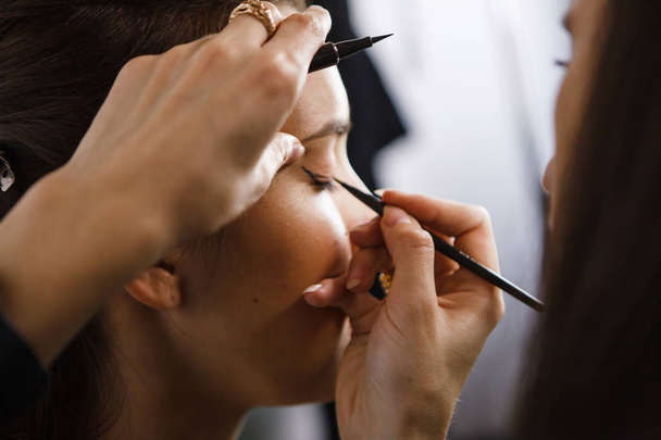 makeup artist applying eyes makeup - Photo, Image