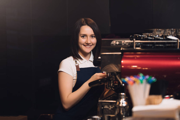 Barista working at coffee machine - 写真・画像