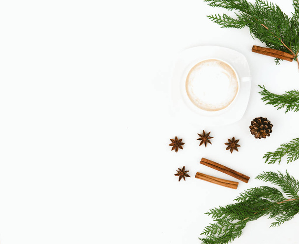 Christmas flat lay composition with cup of coffee over white background - Foto, Imagen