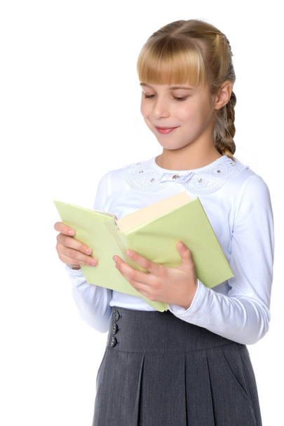 Little girl with a book - Fotoğraf, Görsel