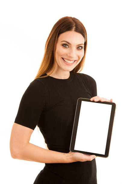 Young happy business woman shows a tablet wth blank display isol - Foto, immagini