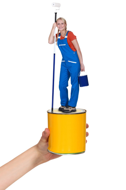 Decorator standing on paint pot - Φωτογραφία, εικόνα