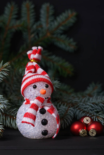 New Year background. Snowman and fir tree - Foto, imagen