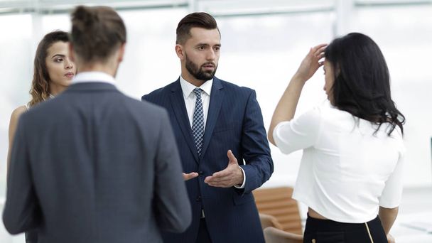 business people argue standing in office - Фото, зображення