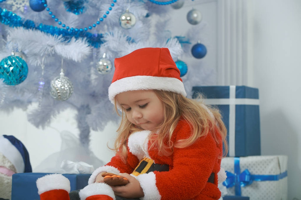 Christmas happy child with bear and gift, cyber monday. - Valokuva, kuva