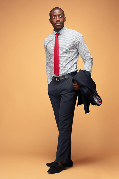 cheerful african businessman looking at the camera - Photo, image