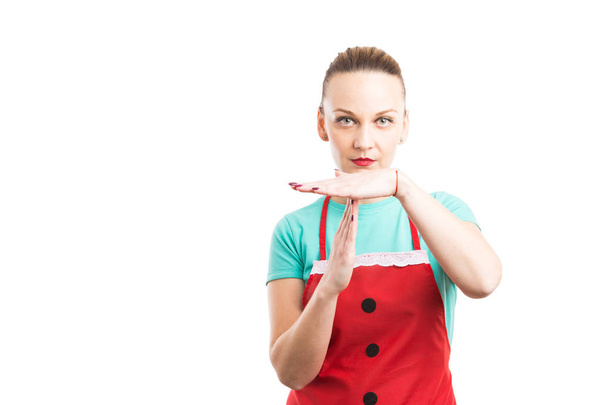 Tired housekeeper or maid showing time out gesture - Photo, Image