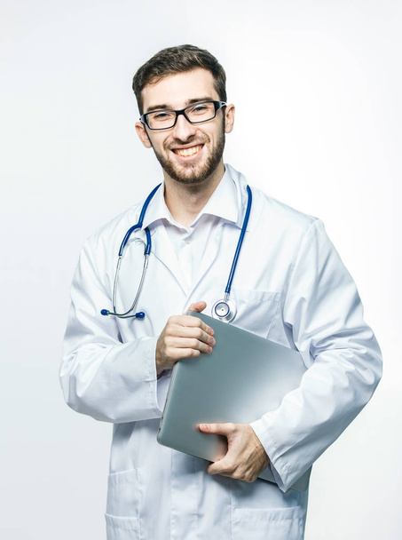 portrait is an experienced therapist with stethoscope on white background - Photo, image
