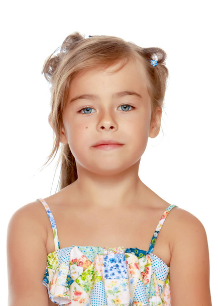 Tanned little girl in a swimsuit - Фото, зображення