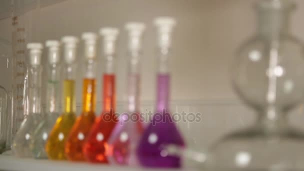 Lab flasks with chemical liquids. - Footage, Video