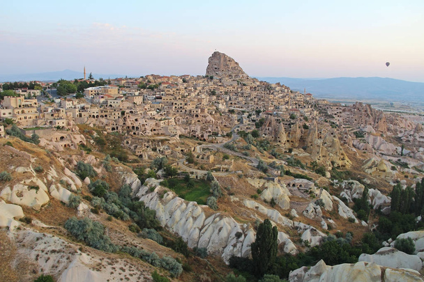 Town of Uchisar at the sunrise, Cappadocia. Turkey. - Fotoğraf, Görsel