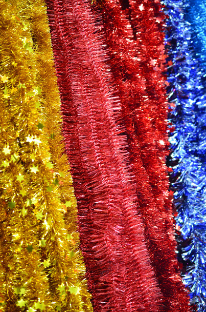 Multicolored Christmas fluffy tinsel of foil. - Photo, Image