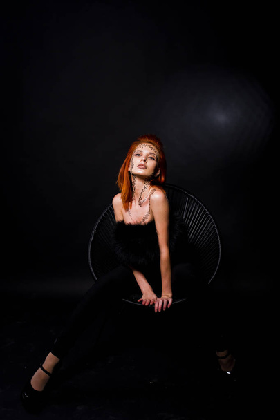 Fashion model red haired girl with originally make up like leopa - Fotoğraf, Görsel