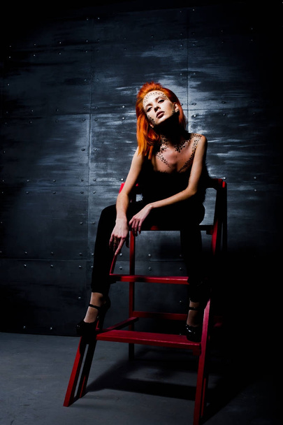 Fashion model red haired girl with originally make up like leopa - Foto, immagini