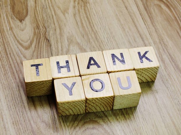 thank you word wooden block on wooden background - Foto, immagini